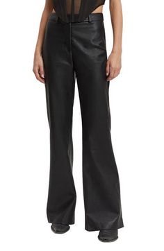 Tailored charm meets on-trend style in these high-waisted pants made from buttery faux leather complete with kicky flared legs. 31 1/2" inseam; 23" leg opening; 11" front rise; 15" back rise Zip fly with button closure Back welt pockets 100% polyester with polyurethane coating Hand wash, line dry Imported Flare Leg Pants, Trend Style, High Waisted Pants, Welt Pockets, Bottoms Pants, Leg Pants, Black Pants, Womens Bottoms, High Waist