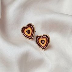 Don't miss out on this beautiful gold plated and brown retro heart stud earrings. They work with a large variety of looks and add a bit of sparkle to your outfit. MORE jewellery pieces avaliable on our shop! Any questions please message we are happy to help. Free postage in UK Thank you for shopping with us Heather&Bumble 📪Follow us at: Instagram: heatherandbumble Twitter: Heather_Bumble Pintrest: Heather & Bumble Brown & Gold Retro Heart Stud Earrings -  Brown 70's Style Earrings,Vintage Style,Brown Jewellery,Gold Earrings,Gold Heart Stud Earrings Vintage Gold Heart Earrings For Party, Cheap Vintage Brown Earrings, Vintage Earrings 70s, Vintage Gold Heart Drop Earrings, Retro Gold Heart-shaped Earrings, Retro Heart-shaped Earrings For Valentine's Day, Gold Heart Stud Earrings, Retro Heart, Gold Heart Studs