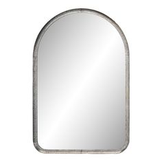 an oval metal mirror on a white background