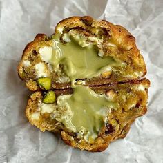 some type of pastry with green sauce on it