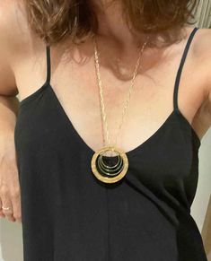 Woman wearing a Madera Design Studio Necklace. 4 gold circles and one wooden circle hang from a paperclip chain Wooden Circle, Wood Circles, Geometric Jewelry, Circle Necklace, Jewelry Ideas, Milestones, Handmade Necklaces, Circles, Philadelphia