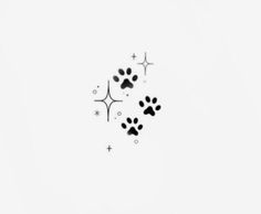 an animal's paw prints are shown in black and white on a sheet of paper