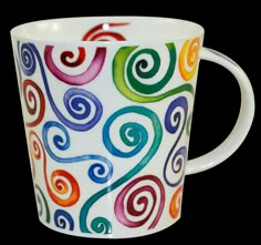 a coffee cup with colorful swirls painted on it