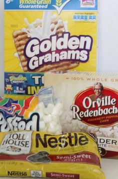 three packages of cereal and other foods on a table