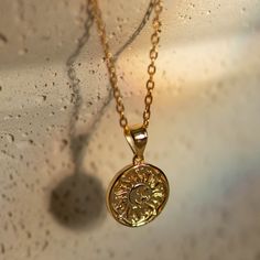 Radiate in our Sun necklace. - Waterproof, tarnish resistant & hypoallergenic- Made in gold vermeil: a thick 18k gold layer on sterling silver.- Adjustable chain 17 to 18 in.- Pendant size: 12.5 mm Sun Necklace, Star Pendant Necklace, North Star, Star Pendant, Star Charms, Gold Vermeil, 18k Gold, Size 12, Charms