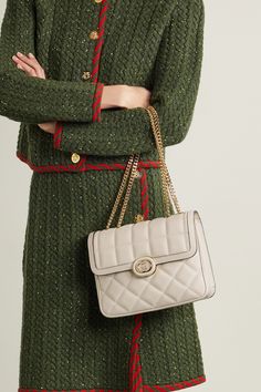 Inspired by styles from Gucci's archives, this boxy 'Deco' shoulder bag is made from quilted leather and accented with the brand's interlocking 'GG' logo. Adjust the chain strap to carry it on your shoulder or as a top handle. Gucci Deco Bag, Designer Rectangular Shoulder Bag With Cc Turnlock Closure, Beige Gucci Bag With Turn-lock Closure, Gucci Beige Bags With Turn-lock Closure, Designer Quilted Beige Shoulder Bag, Designer Shoulder Bag With Cc Turnlock Closure, Timeless Quilted Shoulder Bag, High-end Quilted Shoulder Bag For Everyday Luxury, Chic Gucci Shoulder Bag With Cc Turnlock