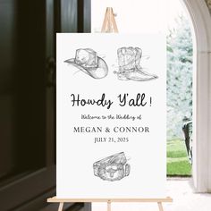 an easel with a sign on it that says, holiday y'all welcome to the wedding of megan and connor july 21, 2013