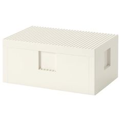 a white lego box with two holes in it