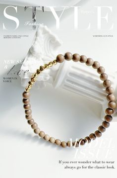 🐨 Discover the timeless appeal of our exquisite Sandalwood beaded bracelet, carefully crafted with an eye for detail. Indian Sandalwood Bracelet with 4mm Beads, suitable for a wrist circumference of 14-15cm 🐨 Rich Heritage: Each bead, measuring precisely 4mm, is carved from genuine Indian Sandalwood, renowned for its calming scent and ability to purify one's spirit. 🐨 Luxurious Accent: Complementing the classic sandalwood beads are irregular gold nuggets, plated in 14K gold, adding a touch of opulence and elegance.  🐨 Versatility at Its Finest: The bracelet's understated design pairs seamlessly with other accessories, making it perfect for layering. Whether worn standalone or stacked, it accentuates any outfit. 🐨 Gift of Tranquility: Suitable for both men and women with wrist sizes be Luxury Modern Beaded Bracelets, Luxury Bracelet Suitable For Gift, Modern Luxury Beaded Bracelets, Luxury Gold Beaded Bracelets Modern Style, Luxury Modern Gold Beaded Bracelets, Luxury Carved Beads As A Gift, Sandalwood Bracelet, Indian Sandalwood, Hippie Bracelets