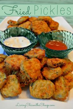 fried pickles on a plate with dipping sauce