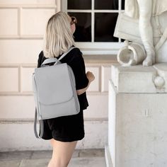 Calm the commute chaos. The ultimate from work to evening bag with the functionality to be worn as a backpack, handbag or a shoulder bag. The multi-wear laptop bag is made with a faux leather exterior and a soft velvet padded lining to ensure your laptop stays safe whilst on-the-go. With space inside for your laptop (up to 15 inch), your phone, multiple pens, cables as well as a large zipped pocket, this bag is not only stylish but super practical. At the front there is a large zipped pocket for Leather Backpack With Removable Pouch For Work, Versatile Backpack For Work, Versatile Backpack With Detachable Strap For Work, Versatile Backpack With Adjustable Strap For Work, Versatile Leather Satchel Backpack For Commuting, Versatile Satchel Backpack For Commuting, Rectangular Soft Leather Backpack For Commuting, Versatile Leather Backpack For Commuting, Soft Leather Rectangular Backpack For Commuting