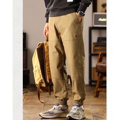 Spring/Fall Loose Washed Khaki Cargo Pants  Material: Cotton+Polyester   Material: 97% Cotton + 3% Spandex  Size: S, M, L, XL, 2XL, 3XL, 4XL Color: Khaki Pants Type: Cargo Pants Style Type: Street Trendy  Season: Spring, Fall, Winter,   Occasion: Leisure, Outdoor, Daily, Vacation, Fall Outfits Khaki Cotton Outdoor Joggers, Khaki Cotton Joggers For Outdoor, Cotton Khaki Joggers For Outdoor, Brown Stretch Casual Cargo Pants, Casual Stretch Brown Cargo Pants, Casual Beige Pants For Outdoor Activities, Cotton Joggers For Fall Outdoor Activities, Solid Pants For Fall Outdoor Activities, Fall Cotton Joggers For Outdoor Wear