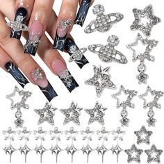 PRICES MAY VARY. Value Pack:You will get 30pcs bling star charms for nails in 6 different style,including star,starlight and planet shape.For one pack,there are enough quantity to allows you to create various unique nails art design. Stylish Design:Each nail art jewelry is uniquely designed,inluding planet shape,starlight shape,star shapes.Silver metal base inlaided with shiny crystal rhinestone,making our nail accessories bling and stylish.The design has charming Y2K style,could make your nails Sliver Nails, Planet Nails, Nail Gems, Nail Charm, Nail Art Jewelry, Y2k Nails, Nail Supplies, Gem Nails, Nail Jewelry