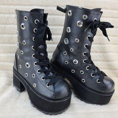 Demonia Ranger-310 3 3/4" (95mm) Heel, 2 1/4" (57mm) Platform Lace-Up Front Ankle Boot Featuring Multi-Size Eyelets On Upper, And 1" Wide Shoe Lace, Back Zip Closure W/ Skull Zip Closure Head. New In Box Punk Heels With Reinforced Heel And Round Toe, Black High Ankle Heeled Boots With Metal Feet, Gothic Platform Boots With Reinforced Heel And Round Toe, Gothic Platform Boots With Reinforced Heel, Black Gothic Heeled Boots With Round Toe, Gothic Black Heeled Boots With Round Toe, Gothic Black Boots With Grommets, Black Platform Boots With Reinforced Heel And Closed Toe, Black Closed Toe Platform Boots With Stacked Heel