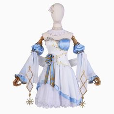 a white and blue dress with gold trimmings on the shoulders, sleeves, and cuffs