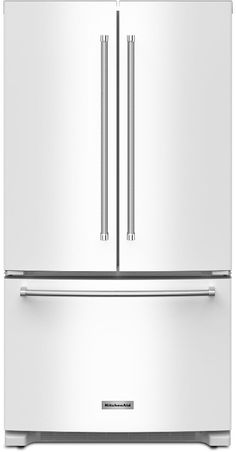 a large white refrigerator freezer sitting next to each other on top of a counter