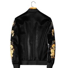 A high-quality Faux Fur Leather Jacket in Classic Black with exquisite Gold Dragon Embroidery. Fabric: Faux Leather Lining: Polyester Size: M to 4XL Color: Black Closing: Zipper Baseball Jacket Embroidery, Gold Dragon Color: Black Stand-up collar Gender: Male Age: Adult Brand Name: NoEnName_Null Product ID: CJWY136242501 Note: All sizes are 1 to 2 sizes smaller than European and American people. Choose the larger size if your size is between two sizes. Please allow 2-3cm differences due to manua Black Embroidered Long Sleeve Outerwear, Black Embroidered Winter Outerwear, Luxury Spring Outerwear With Floral Embroidery, Black Embroidered Outerwear For Fall, Fitted Winter Outerwear With Gold Embroidery, Winter Outerwear With Gold Embroidery And Long Sleeves, Long Sleeve Leather Jacket With Floral Embroidery For Winter, Winter Leather Jacket With Floral Embroidery And Long Sleeves, Black Embroidered Fall Outerwear