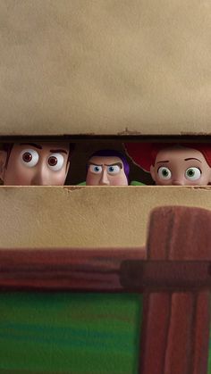 three cartoon characters peeking out from behind a cardboard box