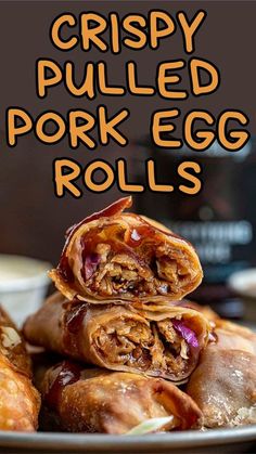 crispy pulled pork egg rolls stacked on top of each other with text overlay