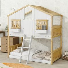 there is a bunk bed with a ladder to the bottom and a loft bed above it