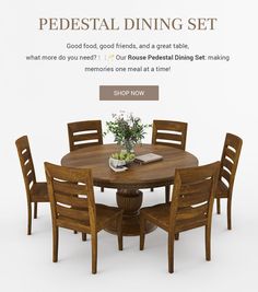 the pedestal dining set is made from solid wood and has four chairs around it, along with