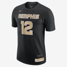 the new nike basketball jersey is shown in black and gold