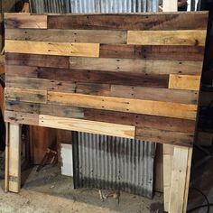 a close up of a wooden wall made out of pallets