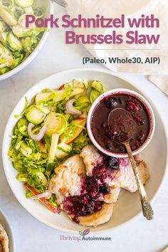 pork schnitzel with brussel slaw in a bowl next to a salad