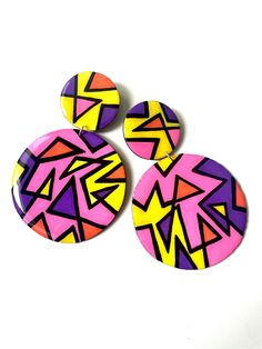 Get into these funky, oversized, sunset-toned earrings! They are sure to add a bold, vibrant statement to any outfit. Each pair is extremely lightweight and easy to wear.  All earrings are made to order. Please allow up to 5 days for this process. As with almost anything handmade, note that there may be slight variations, but the overall design will be the same. Funky Yellow Handmade Earrings, Yellow Funky Handmade Earrings, Funky Handmade Yellow Earrings, Handmade Funky Yellow Earrings, Bold Geometric Designed Earrings, Bold Geometric Earrings With Bold Design, Trendy Yellow Festival Earrings, Trendy Yellow Earrings For Festivals, Bold Geometric Earrings