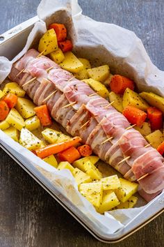 ham, potatoes and carrots in a baking dish