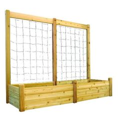 a wooden garden bed with netting on the top and bottom panels, made out of wood