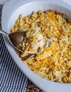 a white bowl filled with macaroni and cheese