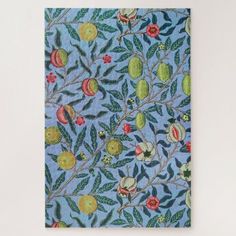 a blue wall hanging with fruit on it