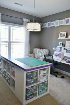 a craft room with lots of storage space