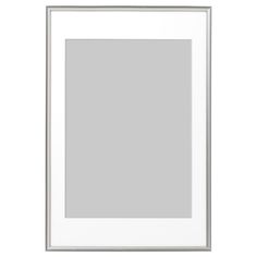 an empty white frame hanging on the wall with a light gray background and silver trim