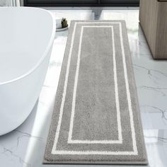 a bathroom rug that is on the floor