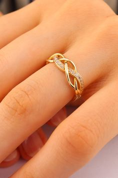 14K Solid Gold Twist Ring - Twist Band Ring - Wide Ring - Solid Gold Stackable Ring - Everyday Ring - Daintly Twist Ring -Gift For Her This solid gold dainty ring is made entirely from 14k solid gold. * Jewelry is packaged and shipped in a delicate jewelry gift box. * If you are purchasing it as a gift, please feel free to add a personal note. Anniversary, Gift For Wife, Christmas Gift Gold Kt: 14K solid gold * Available Gold Color:  * Guaranteed Authentic 14k Gold, Not Plated Or Filled * Stamp: Twist Gold Ring, Casual Rings Women, Gold Infinity Ring With Prong Setting, Simple Gold Rings For Women, Gold Infinity Promise Ring, Gold Infinity Diamond Ring Gift, Simple Ring Designs Gold, Gold Rings Simple Unique, Daily Wear Gold Rings For Women