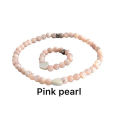 Step into a world of delicate elegance with our "Pink Serenity Set," a stunning combination of a bracelet and ring, each masterfully crafted from radiant 4mm pink Mother of Pearl beads and adorned with a charming white pearl heart. This exquisite set from Bec Sue Jewelry Shop is a tribute to the serene beauty of the ocean, transformed into a wearable symbol of love and grace. Pink Round Beads Jewelry For Mother's Day, Pink Bracelets For Mother's Day, Adjustable Mother Of Pearl Bracelet As Gift, Adjustable Mother Of Pearl Bracelets For Gifts, Adjustable Mother Of Pearl Bracelets As Gifts, Adjustable Pink Jewelry For Valentine's Day, Pink Hypoallergenic Necklace For Mother's Day, Mother Of Pearl Bracelets With Round Beads As Gift, Mother Of Pearl Bracelets With Round Beads For Gift