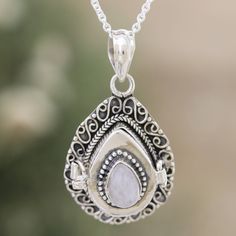 Crafted in India by Rakesh Rana, this sterling silver pendant necklace is a tender piece of art featuring a natural moonstone with unique properties. After adding a combination finish to the accessory, the gemstone crowns the design with a luminous accent, attracting peace and health. On top of that, it is also a locket that allows you to carry a little photo or item within. Oxidized Moonstone Jewelry As Gift, Moonstone Jewelry With Pearl Pendant, Moonstone Jewelry With Oxidized Finish For Gift, Engraved Moonstone Necklace For Spiritual Style, Moonstone Pearl Pendant Jewelry, Sterling Silver Teardrop Locket Jewelry, Amulet Style Moonstone Pendant Necklaces, Oxidized Moonstone Jewelry Gift, Spiritual Engraved Moonstone Necklaces