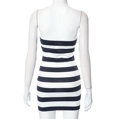 This dress features a strapless design and chest wrap detailing, creating a flattering and modern silhouette. The striped pattern adds a touch of sophistication to the look. - Color: Black- Style: Bodycon- Pattern Type: Stripe- Sleeve Length: Strapless- Length: Mini - Fabric: Polyester- Fit Type: Slim Fit- Occasion: Casual, Party- Gender: Women- Size: S, M, L Striped Bodycon Beach Dress, Striped Bodycon Dress For The Beach, Striped Fitted Mini Dress With Spaghetti Straps, Striped Mini Dress With Spaghetti Straps, Striped Strapless Dress For Party, Striped Strapless Party Dress, Fitted Striped Dress With Spaghetti Straps, Striped Fitted Dress With Spaghetti Straps, Fitted Strapless Striped Dress