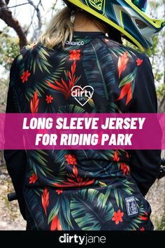 the back of a person wearing a helmet with palm leaves on it and text overlay that reads long sleeve jersey for riding park