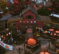 an aerial view of a small farm with lots of pumpkins and other things in the yard