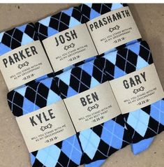 four pairs of socks with labels on them