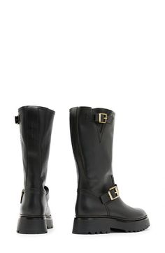 "Find ALL SAINTS Marisa Biker Boot on Editorialist. The edge of a biker boot meets the finesse of buttery-smooth leather with this knee-high essential detailed with bold gleaming buckles and a lugged platform. 2\" heel, 1 1/2\" platform (size 39) 12\" shaft, 13 1/2\" circumference (size 39) 16\" shaft Pull-on style Leather upper and lining/rubber sole Made in Portugal" All Saints, The Edge, Biker Boot, Smooth Leather, Black Boots, Knee High, Rubber Sole, Leather Upper, Portugal