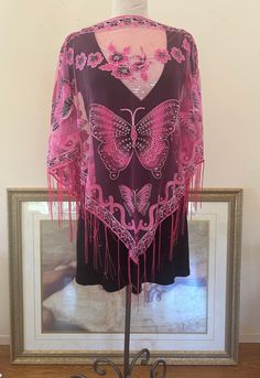 Pink Poncho , Semi Sheer Poncho, Butterfly, fringed Beautiful  Poncho with a scalloped flowers and Butterfly design Great as a swim suit cover, to wear with jeans or black pants and top So pretty and feminine and just completes the outfit. Pink, Semi Sheer Poncho, Butterfly Semi Sheer Poncho, Butterfly, Beautiful, Handmade, Poncho top Black Pants And Top, Handmade Poncho, Sheer Poncho, Pink Poncho, Butterfly Beautiful, Pants And Top, Poncho Top, Swim Suit Cover, Ladies Poncho