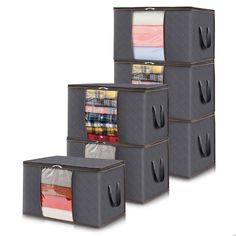 four storage bins with different types of fabric in them