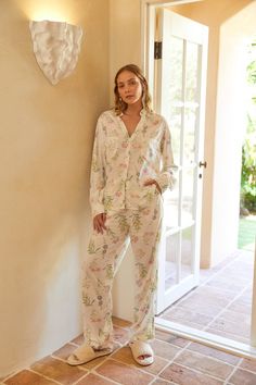 Description A cult favourite, the Maggie Pyjama Set is a timeless style, featuring a relaxed cut in our signature soft 100% rayon. This romantic field floral was designed by Joannie Houle ♡ Very relaxed style fit, fabric has a nice drape Unlined, skin coloured underwear is recommended Mandarin style collar and full button top closure Full length pants with elastic, drawstring and side pockets Pre-washed 100% rayon fabric (similar to a lightweight cotton however softer to the touch) Comes with drawstring cotton bag and gift card for easy gift-giving Sizing Loli is wearing a size S, and is a standard Australian size 8, US size 4, approx 5'9 tall. Relaxed style fit so size down if preferred. The following guidelines can be applied to sizing (these are the garment measurements): Sizes AUS US B Joannie Houle, Resort Wear Men, Full Length Pants, Man Child, Sleep Set, Button Top, Wild Flower, Pyjama Set, Rayon Fabric