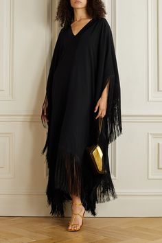 As its name suggests, Taller Marmo's 'Very Ross' kaftan is inspired by the styles pop icon, Diana, is known for wearing. It's been made in Italy from fluid crepe that drapes beautifully and has a satin V-neckline and tactile fringing outlining the one-size-fits-most silhouette. Wear it with metallic accessories. Fringe Kaftan Dress, Fringe Kaftan, Abaya Business, Black Kaftan Dress, Taller Marmo, Net Sustain, Black Kaftan, Round Eyewear, Ankara Designs