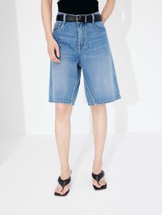 MO&Co. Women's Cotton Bermuda Denim Shorts Knee Length Spring Knee-length Jean Shorts With Belt Loops, Denim Knee-length Shorts With Belt Loops, Denim Blue Short Length Jeans With Belt Loops, Dark Wash Shorts With Belt Loops For Spring, Denim Jeans With Belt Loops And Short Legs, Spring Dark Wash Shorts With Belt Loops, Blue Short Jeans With Belt Loops, Denim Blue Five Pocket Shorts, Cutoff Denim Blue Shorts With Belt Loops