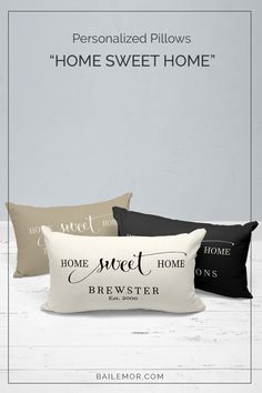 three pillows with the words home sweet home on them, and an image of a house